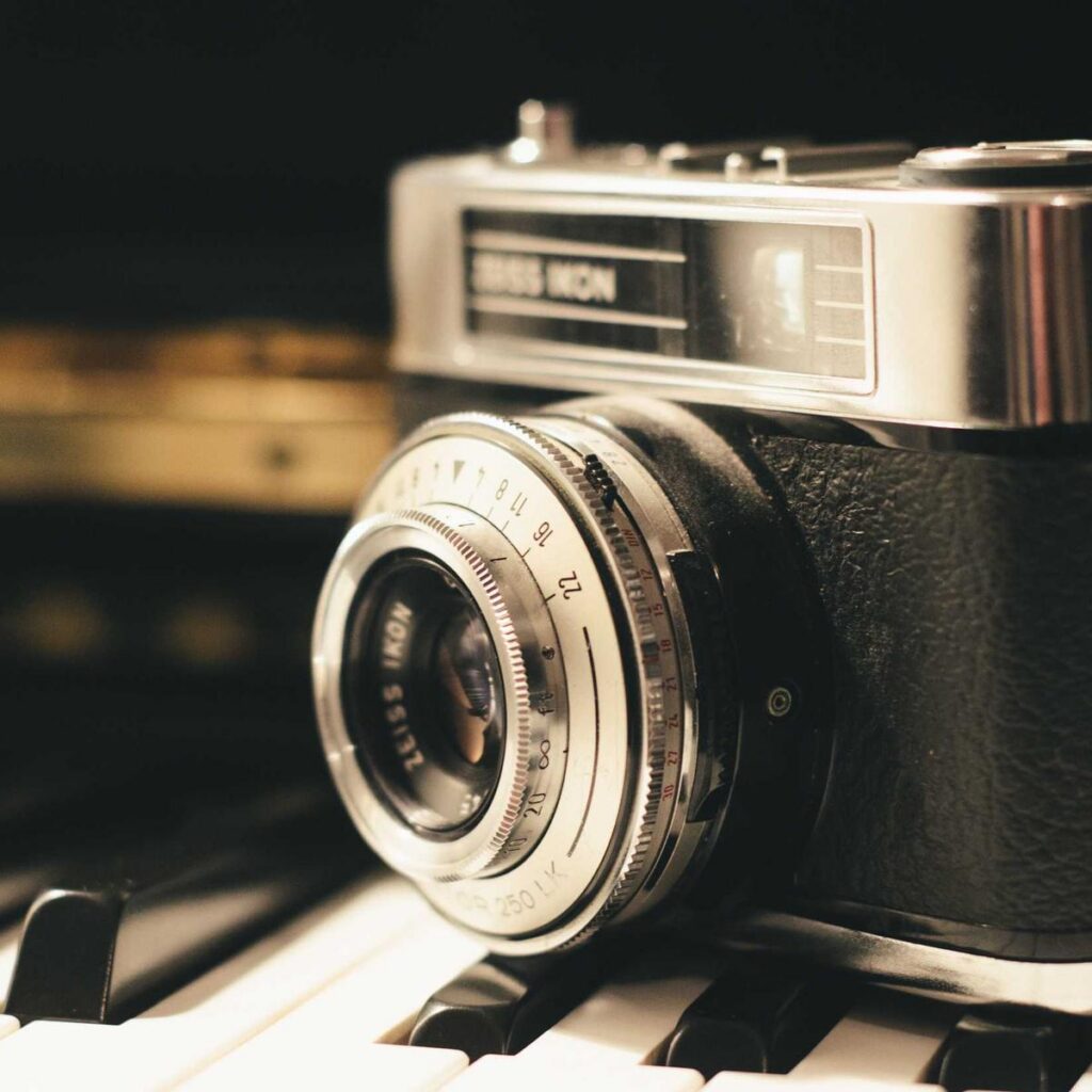 A silver and black film rangefinder camera